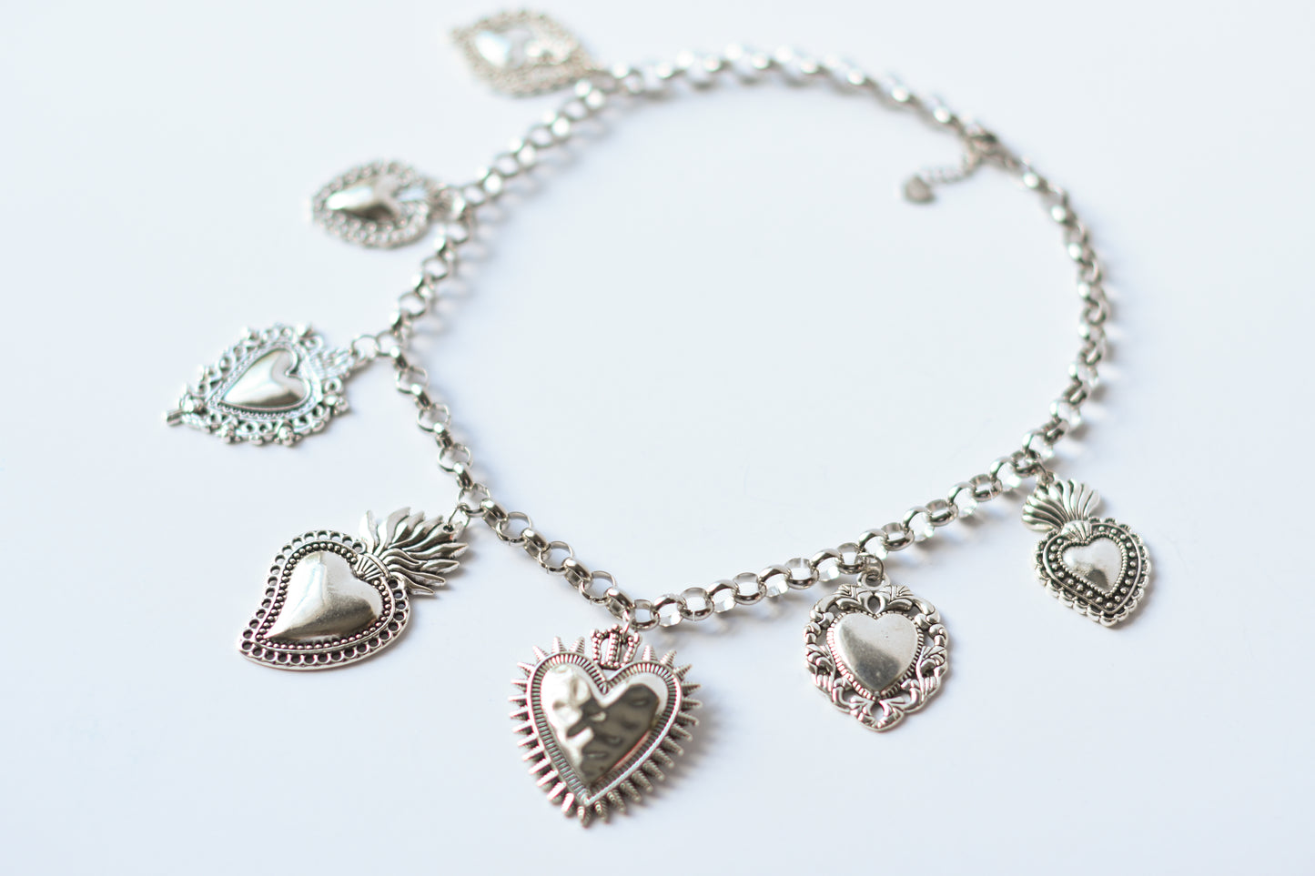 Milagro Hearts Charm Necklace – Gold & Silver Variants
