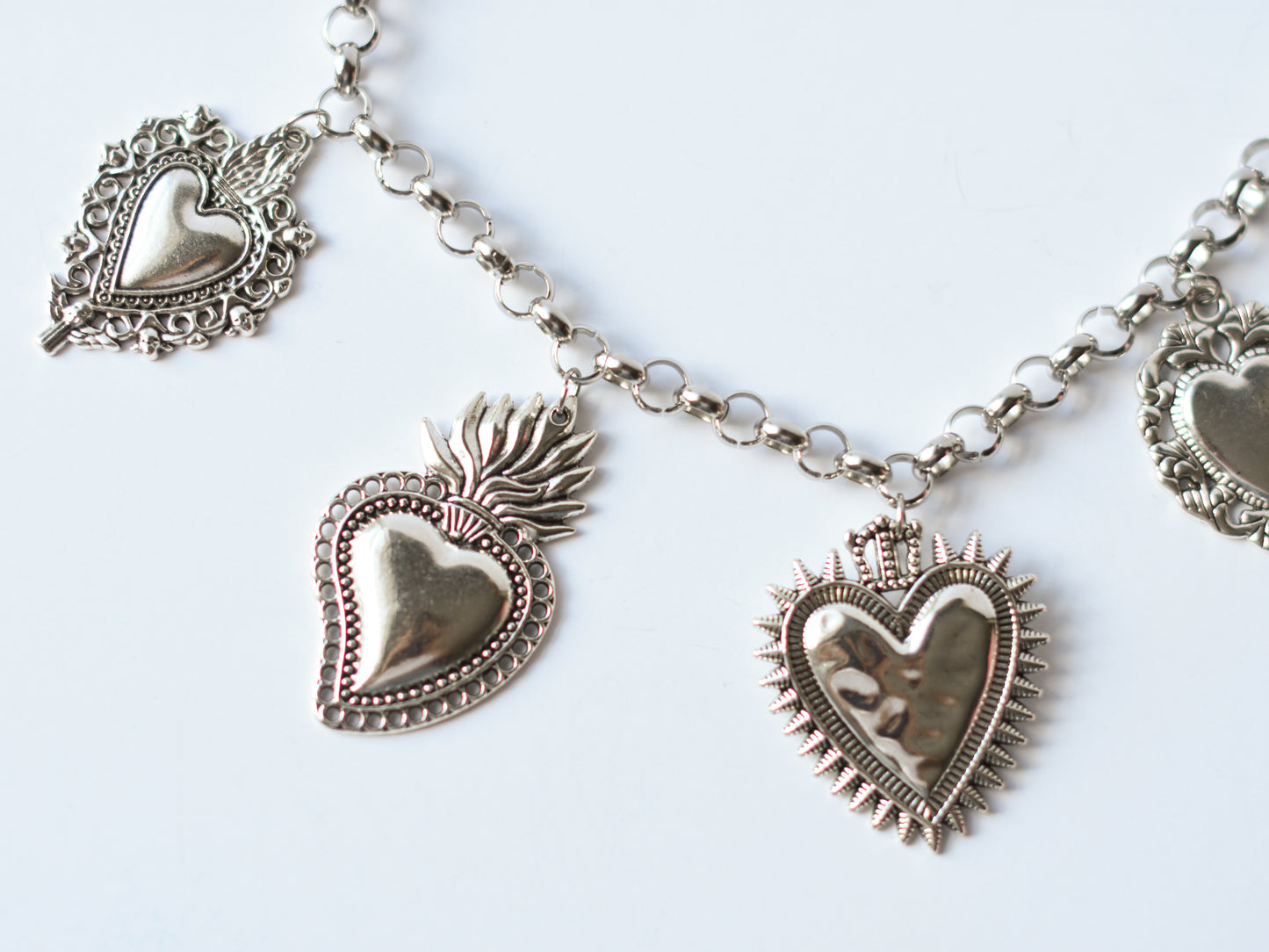 Milagro Hearts Charm Necklace – Gold & Silver Variants