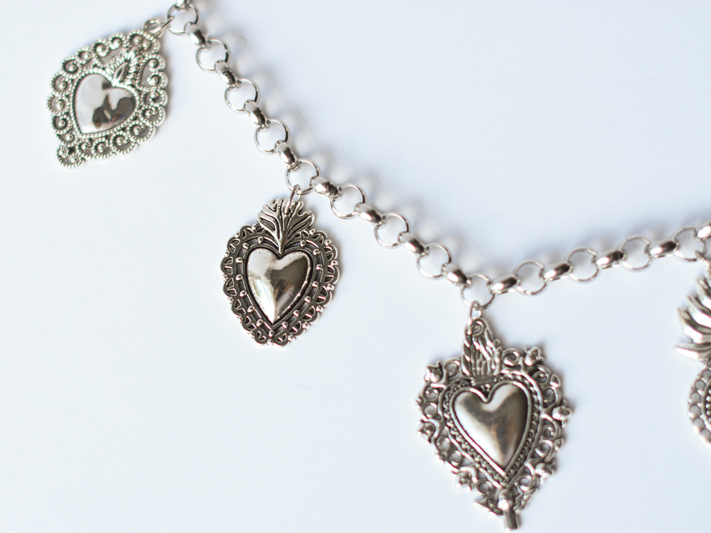 Milagro Hearts Charm Necklace – Gold & Silver Variants