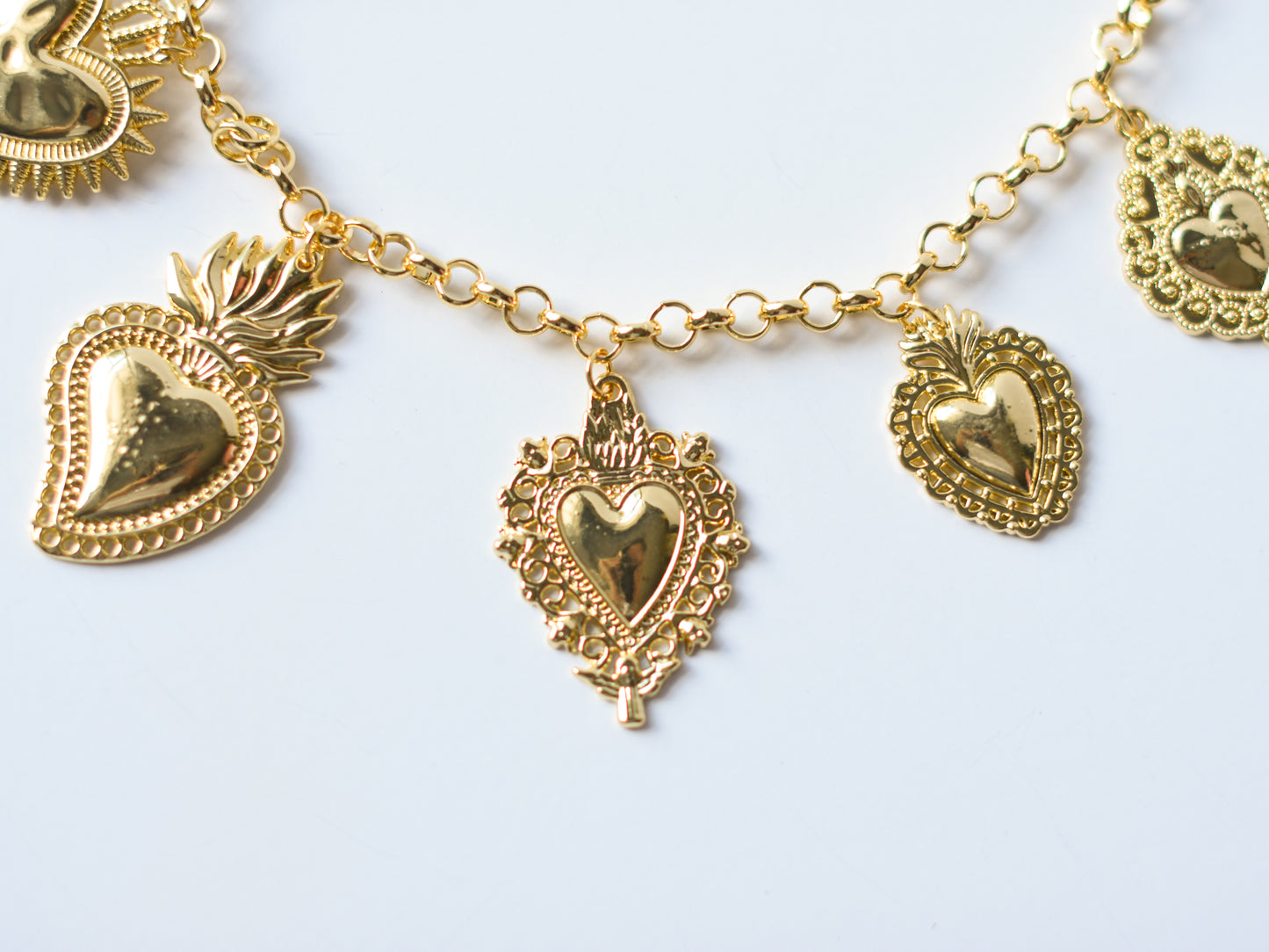Milagro Hearts Charm Necklace – Gold & Silver Variants